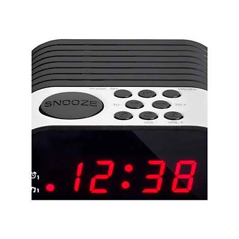 Nahaufnahme eines digitalen Radioweckers mit roter LED-Anzeige 12:38 und Bedientasten oben.