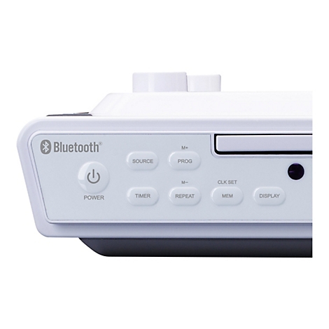 Nahaufnahme eines weißen Radios mit Bedienelementen und Bluetooth-Symbol. Knöpfe mit Funktionen beschriftet.