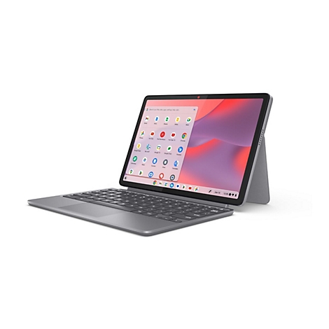 Graues Tablet mit Tastatur, Bildschirm zeigt Apps. Aufsteller hinten. Auf dem Bildschirm sind Google-Apps abgebildet.