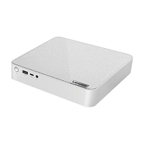 Ein weißer Lenovo-Mini-PC, diagonal von oben links nach unten rechts fotografiert. Auf der Oberseite befinden sich parallele, geriffelte Linien. Auf der Vorderseite sind Anschlüsse zu sehen.