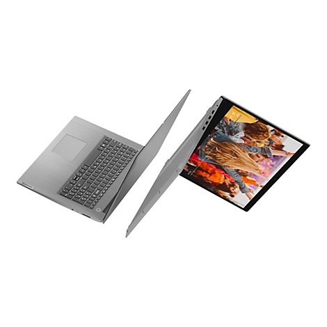 Ein grauer Laptop, teilweise geöffnet, zeigt ein Bild einer Person auf dem Bildschirm.