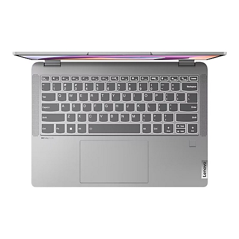 Draufsicht auf einen geöffneten Laptop mit grauer Tastatur, Touchpad und dem Lenovo-Logo.