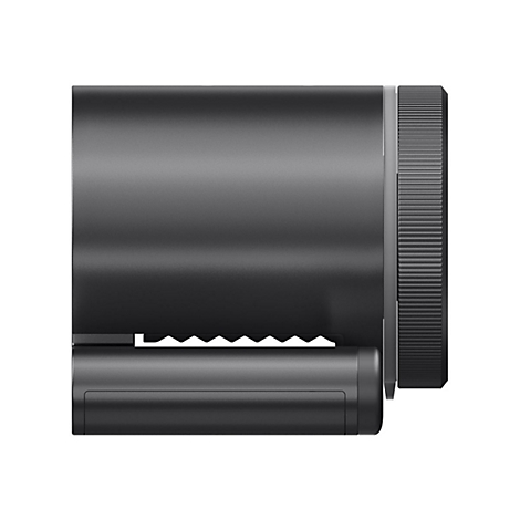 Vue latérale d'un objet cylindrique noir. Dessus lisse, bord dentelé en dessous, bouton rotatif moleté à droite.