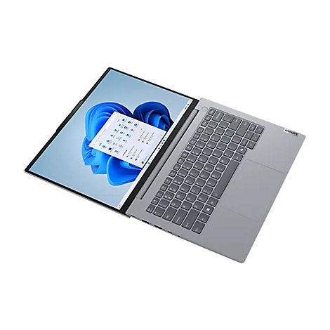 Grauer Laptop mit Windows-Oberfläche geöffnet, Blick von oben. Das Lenovo Logo ist sichtbar.