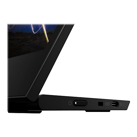 Gros plan d'un ordinateur portable noir, avec les ports en évidence.