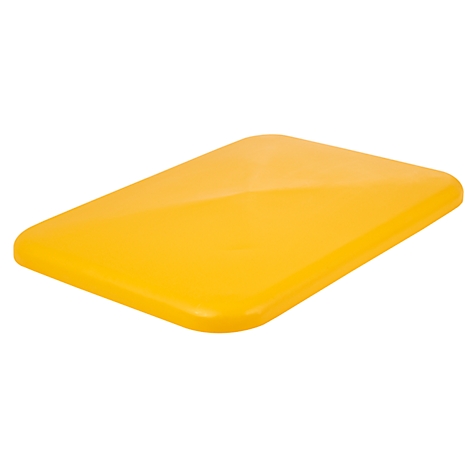 Yellow rectangular object with sloping edges, photographed from above.