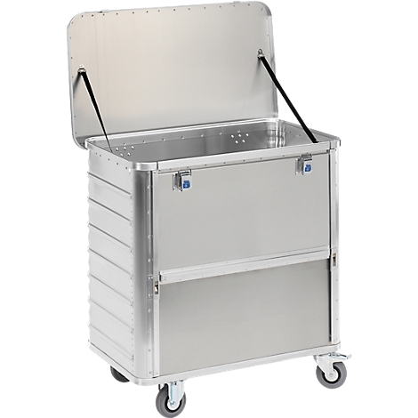 Silver transport box with an open lid. On wheels, with a corrugated sheet look and two blue closures.