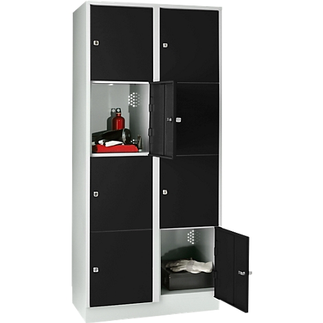 A black and white locker, two doors open. Sports equipment on one side, clothes on the other.