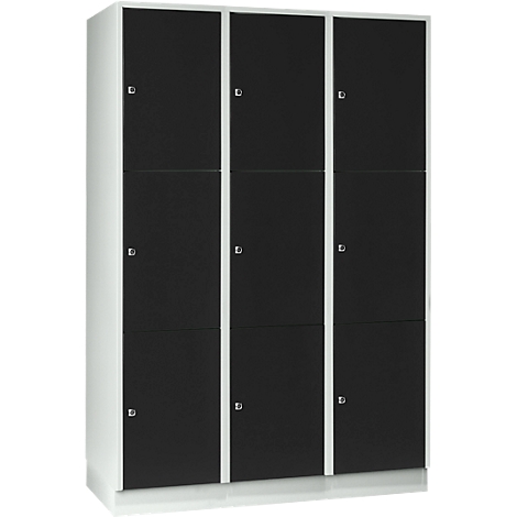Cabinet with nine compartments, black and white. Each compartment has a small handle.
