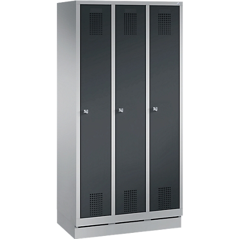 A gray, three-door locker, silver frames, ventilation slots and door handles.