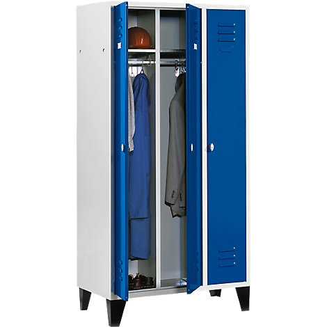 A white and blue locker with open doors, filled with clothes, shoes, and a helmet.