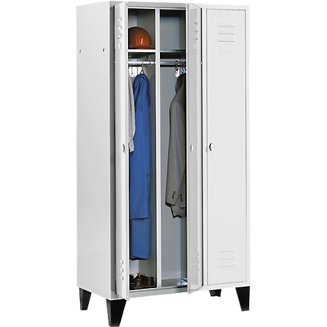 White metal locker with partially open doors, showing clothing, shoes and a helmet.