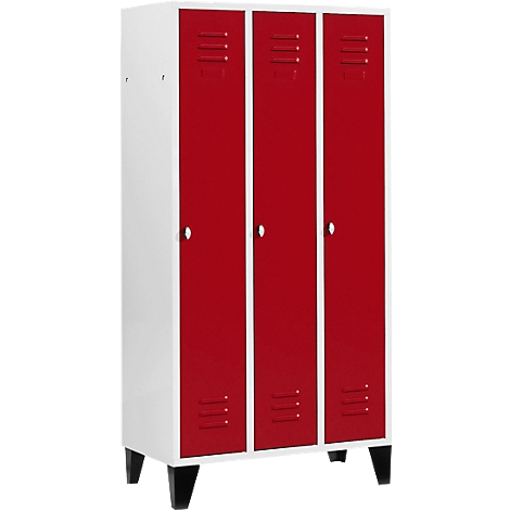 Cabinet with three red doors and white frames. Black feet.