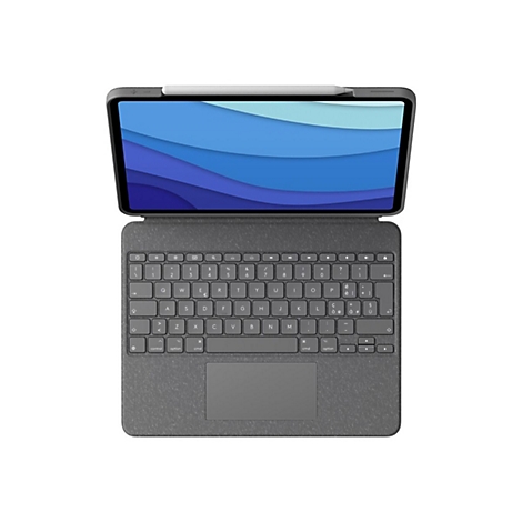 Draufsicht auf ein graues Tablet mit Tastatur. Auf dem Bildschirm blaue Wellen. Stift an der Oberseite.