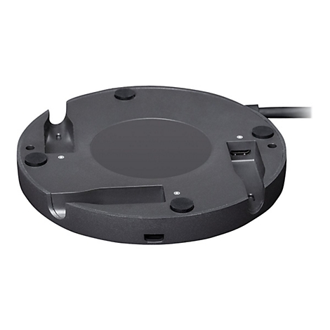 Schwarze, runde Basis mit Aussparungen und Anschlüssen, Ansicht von unten. Kleinere schwarze Füße und eine HDMI-Buchse sind erkennbar.