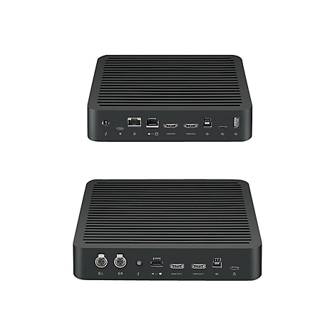 Zwei schwarzfarbene, rechteckige Geräte mit horizontalen Rillen auf der Oberseite. Auf der Rückseite Anschlüsse, wie HDMI, Ethernet und USB.