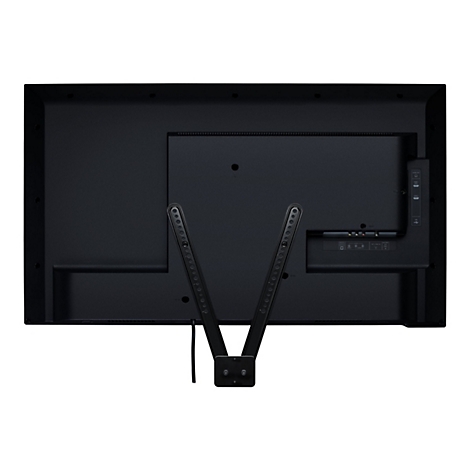 Rückseite eines schwarzen Fernsehers mit Halterung. Oben befinden sich Anschlüsse wie HDMI und Audio Out.