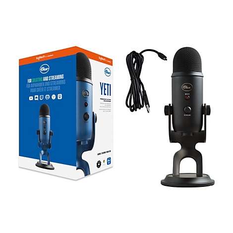 Ein blaues USB-Mikrofon der Marke Blue Yeti mit Zubehör. Auf der Verpackung steht "Für Aufnahmen und Streaming".