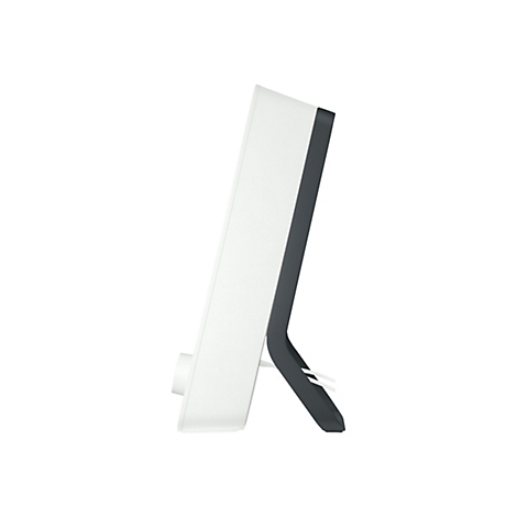 Seitenansicht eines weißen Geräts mit dunkelgrauem Rahmen und Ständer. Auf der linken Seite befindet sich ein runder Knopf.