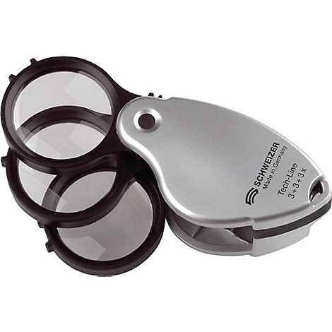 Loupe pliable avec trois lentilles, monture noire et manche argenté, lettrage.