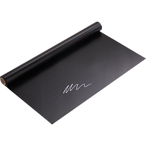 Papel negro enrollado con un garabato blanco.