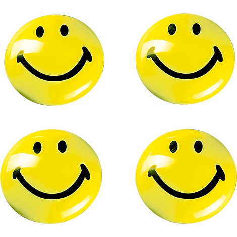 Vier gele smiley gezichten die vriendelijk glimlachen.
