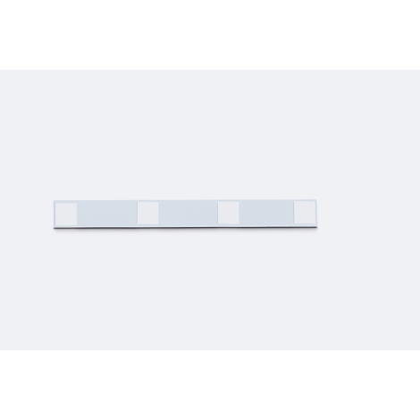 A light gray rectangular strip with white segments, slightly raised against a white background.