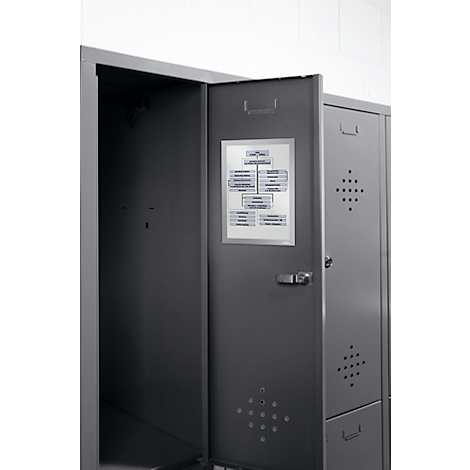 Gray cabinet, door open, with diagram. Behind it, an empty cabinet.