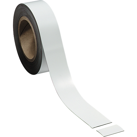 A roll of white, magnetic tape. A section is detached.