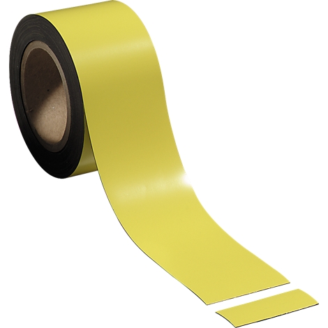 A roll of yellow tape with a black core. A piece of tape lies unrolled next to it.