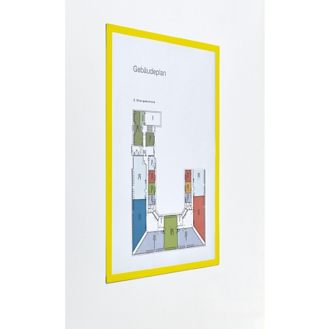 Gelber Magnetrahmen an weißer Wand mit Gebäudeplan, rechts Text zu Anwendung in Büro und Lager.