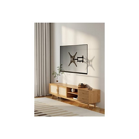 Ein Fernseher hängt an der Wand, montiert auf einer Halterung. Darunter eine Holzkonsole mit dekorativen Elementen.