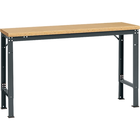 Workbench made of wood and metal. Rectangular tabletop on metal frame with four legs.