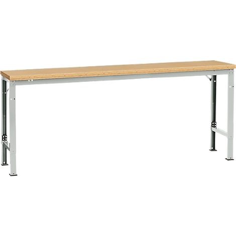 Long, narrow workbench table. Wooden top, gray metal frame.