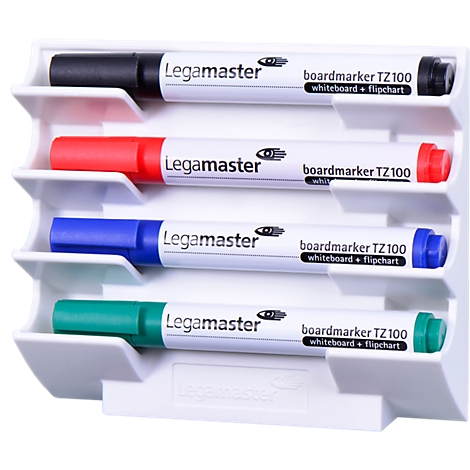 Four colored Legamaster board markers in a white holder. Colors: black, red, blue, green.