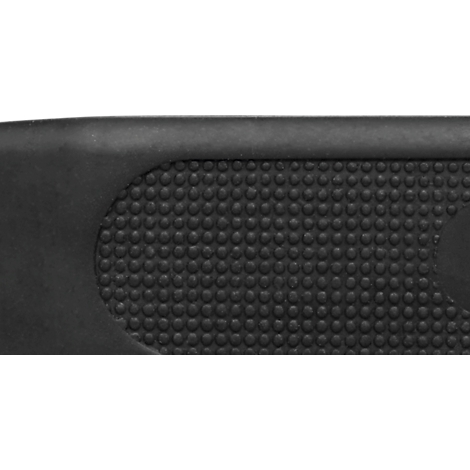 Ausschnitt eines schwarzen Objekts mit einer strukturierten, noppenartigen Oberfläche.