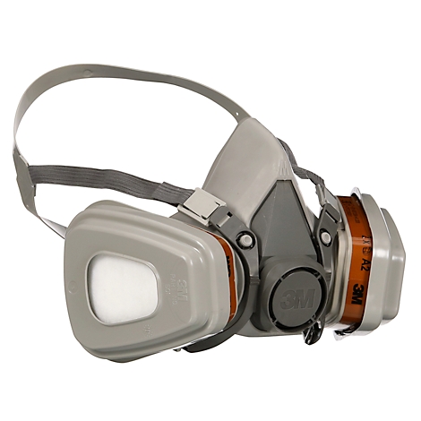 Masque respiratoire gris avec filtres et sangles réglables, vue détaillée.