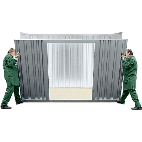 Two workers assembling a metal cabin. They wear green overalls and hold the walls.