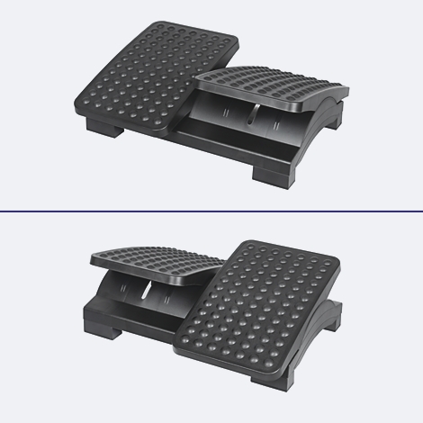 Zwei Ansichten einer ergonomischen, schwarzen Fußstütze mit genoppter Oberfläche vor neutralem Hintergrund.