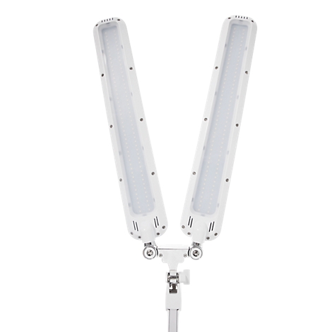 Twee witte LED-lampen vormen een V. Ze zijn bevestigd aan een houder en staan tegen een lichte achtergrond.