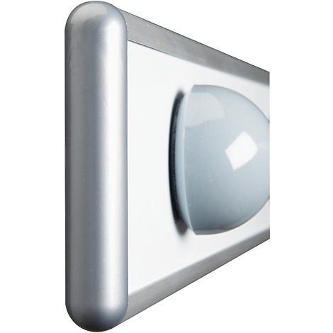 Close-up of a gray, rounded lamp with a white surface and a cylindrical element.