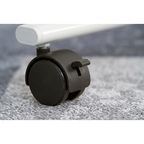 Close-up of a black caster with a brake, connected to a white, cylindrical element.