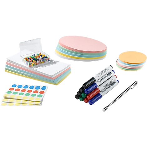 Various office supplies: paper, pens, magnet, adhesive dots and colorful circles.