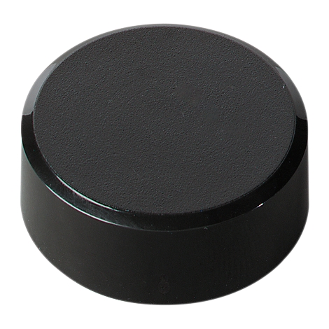 Round, black button. Slightly textured on top, with a glossy edge.