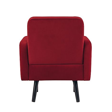 Rode fauteuil, achteraanzicht. De poten zijn zwart, de stof is fluweelachtig.