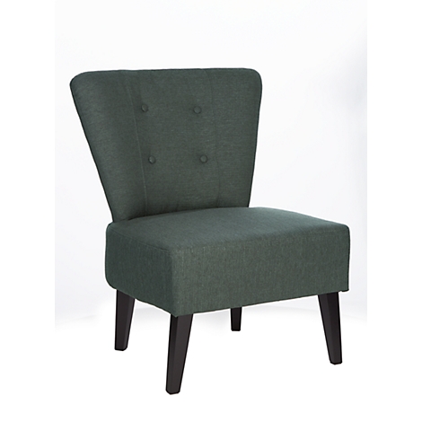 Un sillón verde con patas de madera. El respaldo está ligeramente curvado y decorado con botones.