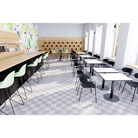 A cafe interior: counter with stools, tables, chairs, floral patterned wall, checkered floor.