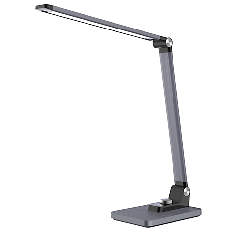 Eine moderne, graue Schreibtischlampe, die auf einem rechteckigen Sockel steht. Der Lampenkopf ist flach und länglich.