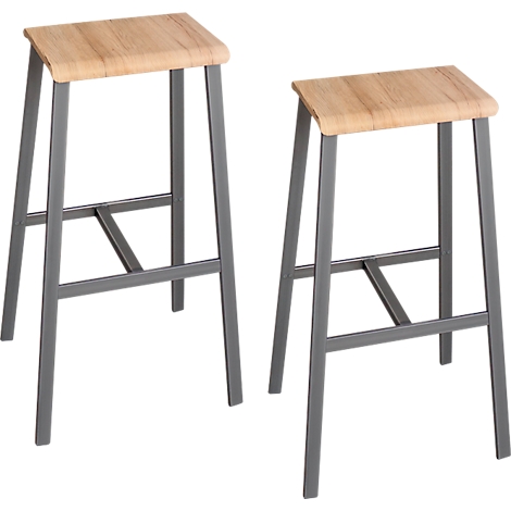 Two bar stools with light brown seats and grey metal legs, against a white background.