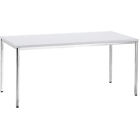 White table with chrome legs. The table is rectangular.